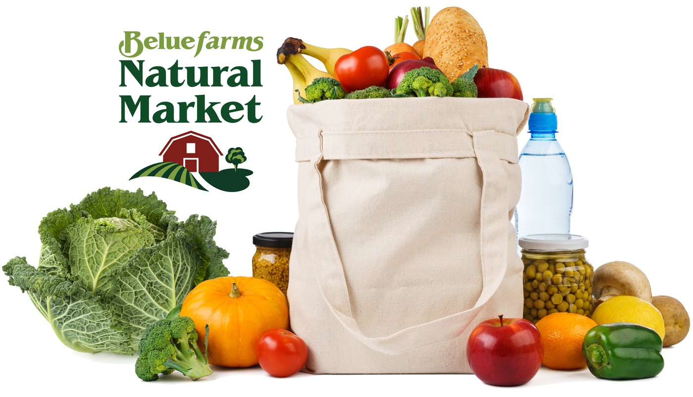 headerGroceries4 White canvas grocery bag filled with a variety of fresh fruits and vegetables